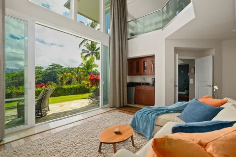 a bedroom with bed and a window