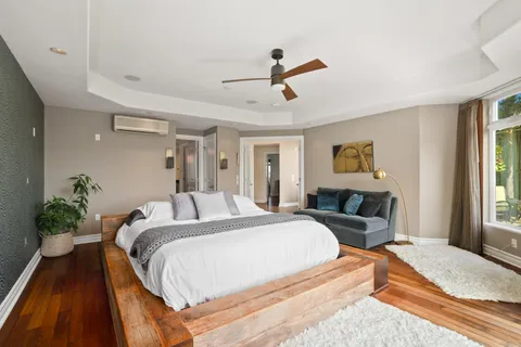 a bed room with a bed and a couch