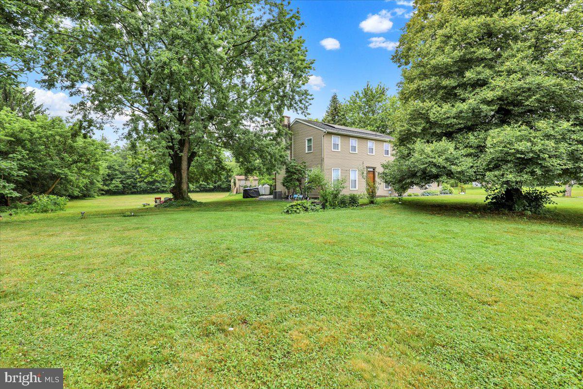 40 Hunters Run Road Honey Brook, PA 19344 - Photo 45 of 47 Spacious yard with serene greenery.