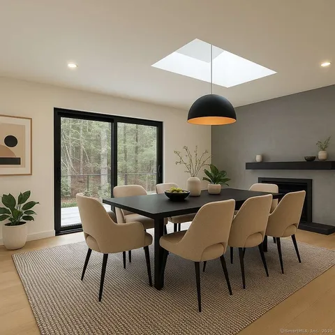 a view of a table and chairs in the kitchen