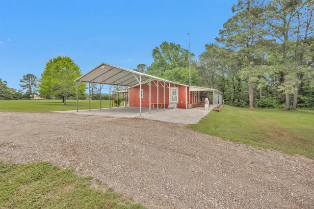 a house view with a garden space
