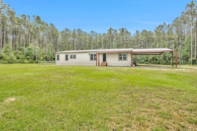 a house view with a garden space