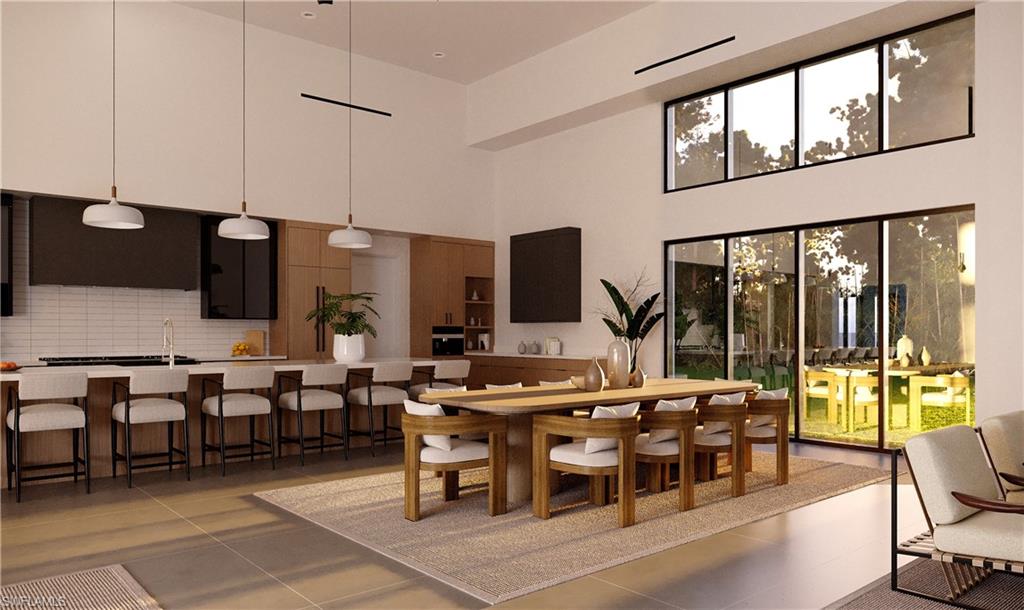 4696 3rd Avenue Northwest Naples, FL 34119 - Photo 5 of 12 a view of a dining area with furniture