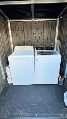 a utility room with washer and dryer