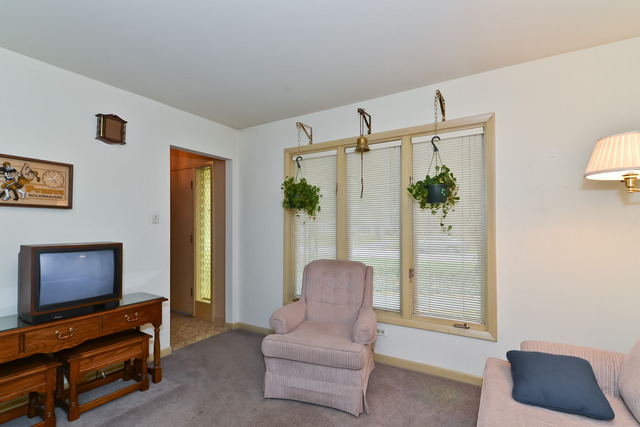 1326 Linden Road Homewood, IL 60430 - Photo 7 of 10 a living room with furniture and a window