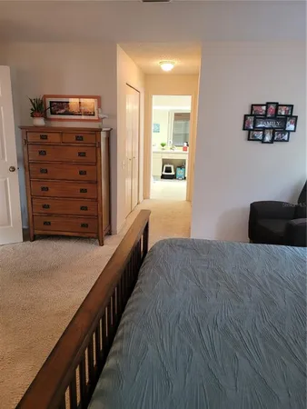 a view of room with furniture and wooden floor