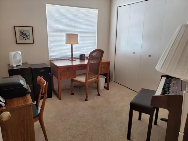 a workspace with furniture and lamp