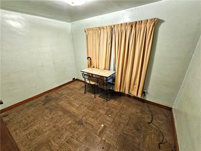an empty room with windows