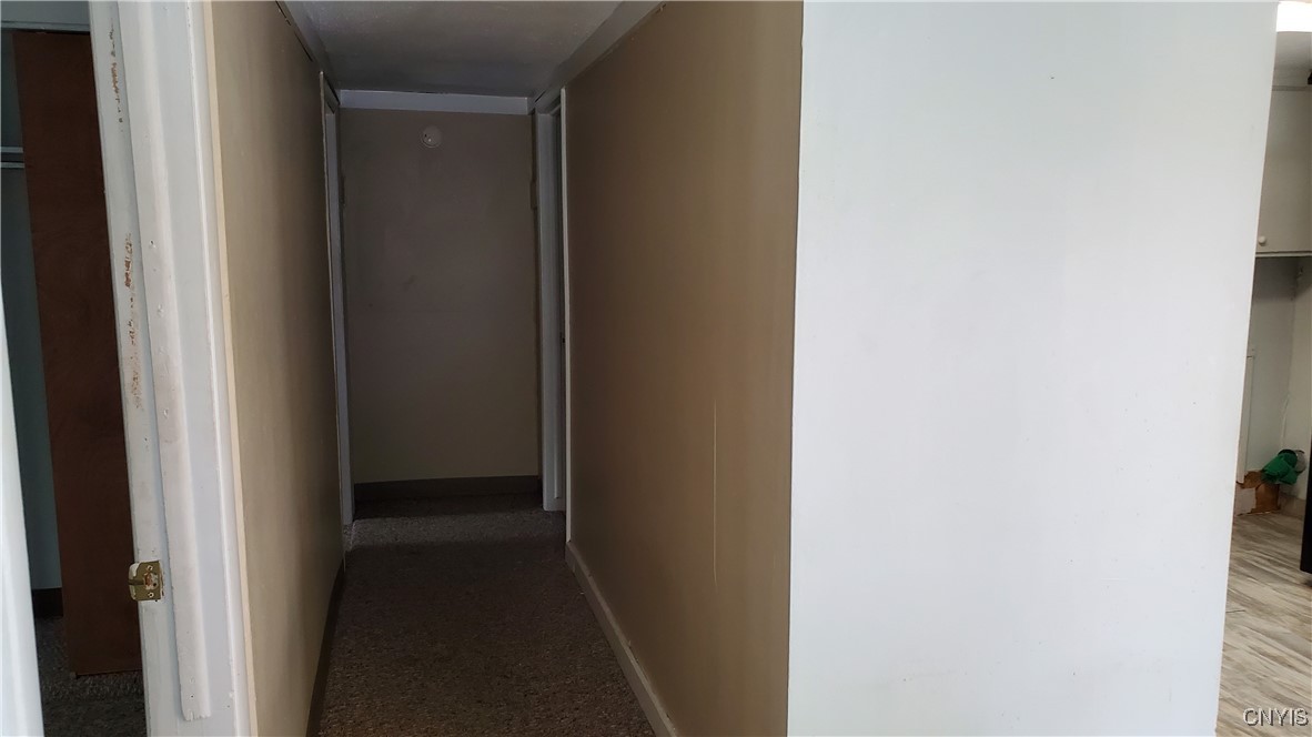 132 West Seneca Street, Unit 2 Manlius, NY 13104 - Photo 12 of 15 Hallway to 2nd bedroom and full bath