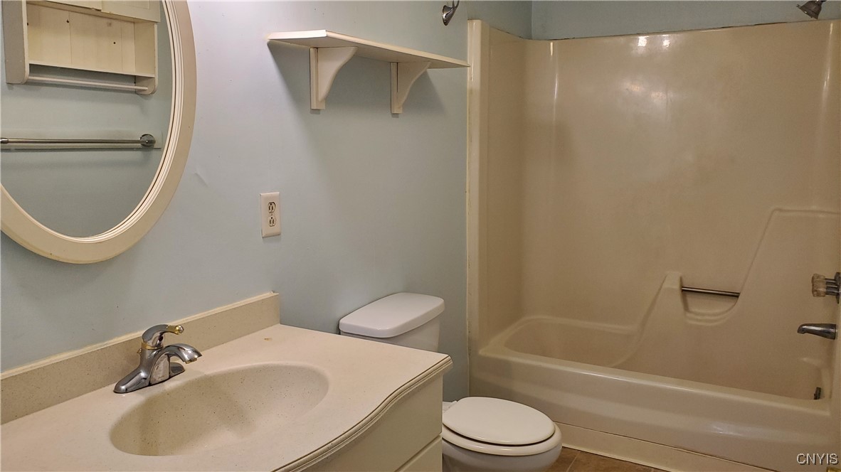 132 West Seneca Street, Unit 2 Manlius, NY 13104 - Photo 15 of 15 Full bath with fiberglass tub-shower unit
