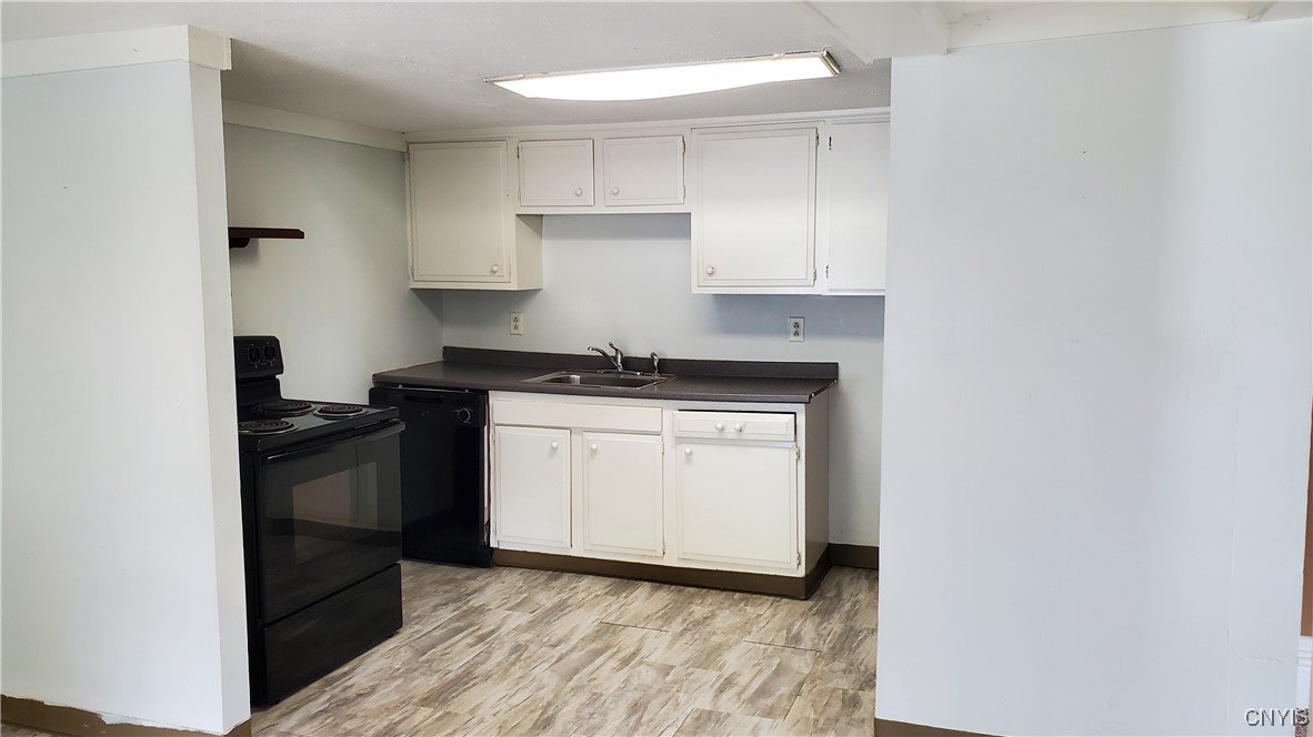 132 West Seneca Street, Unit 2 Manlius, NY 13104 - Photo 4 of 15 Kitchen includes Electric Range, Dishwasher and Re