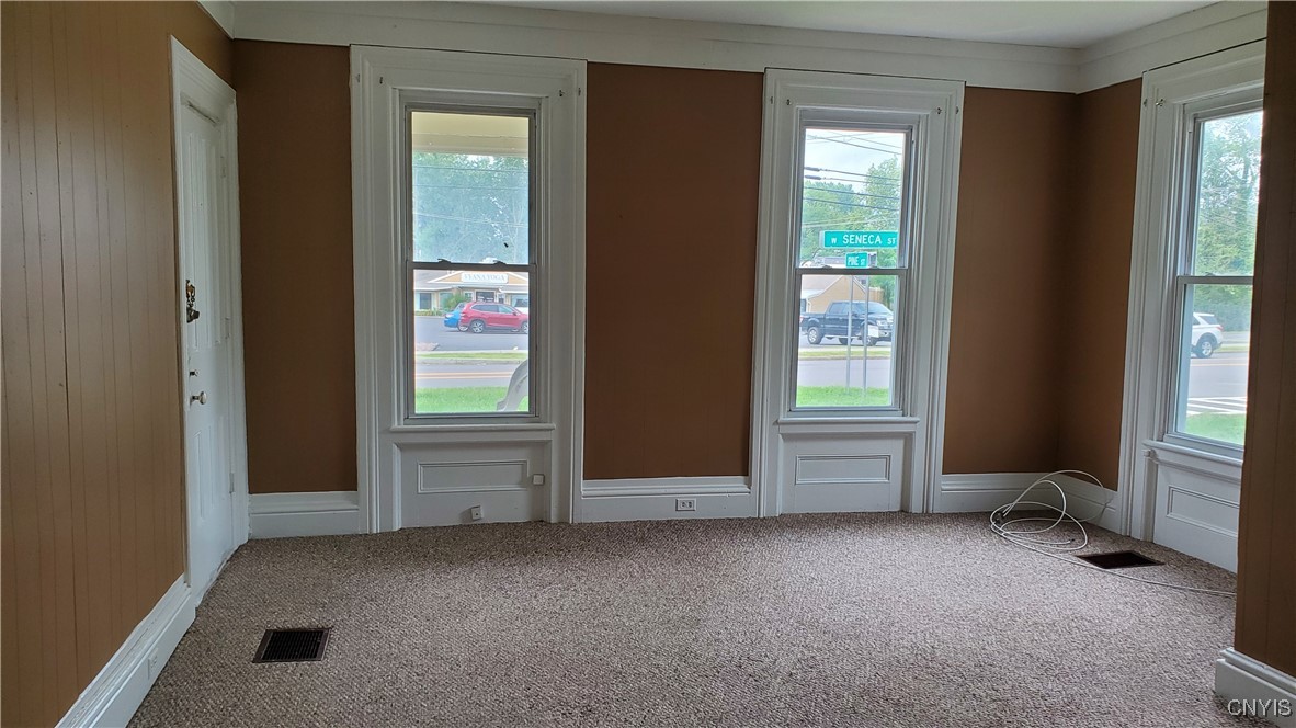 132 West Seneca Street, Unit 2 Manlius, NY 13104 - Photo 7 of 15 Spacious Living room. Door to left can be used to