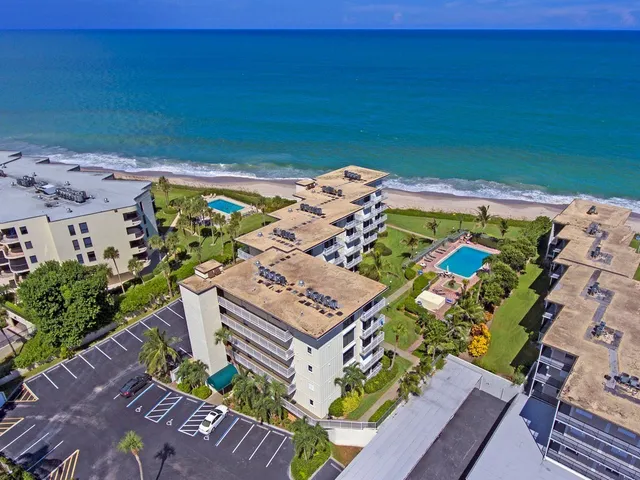 a view of a play ground in front of the house