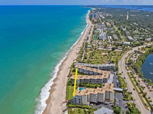 a view of a park with swings and slides