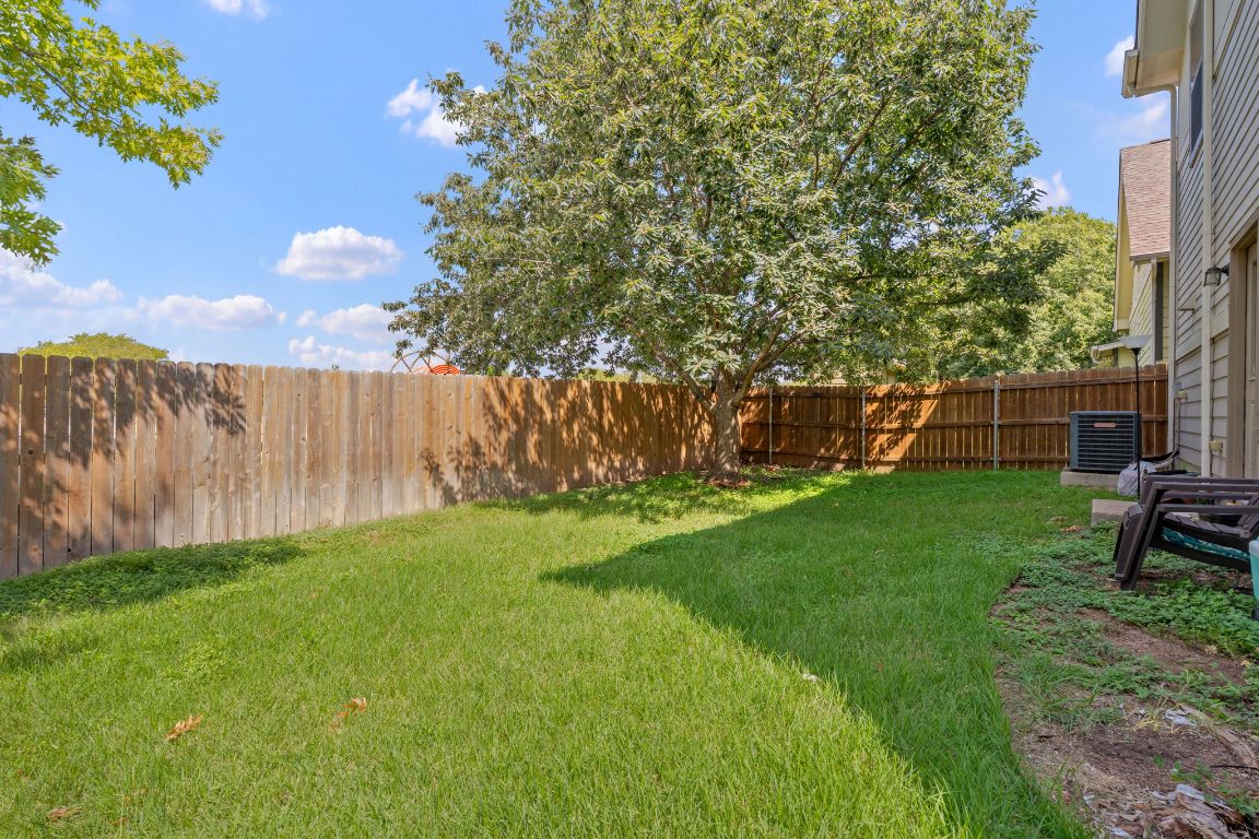10700 Macmora Road, Unit 116 Austin, TX 78758 - Photo 24 of 26 View of fenced backyard