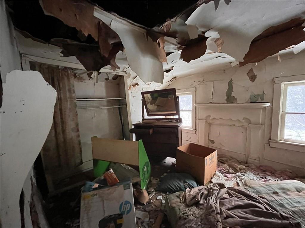 832 Oak Avenue Rochester, PA 15074 - Photo 16 of 50 a room with furniture and a fireplace