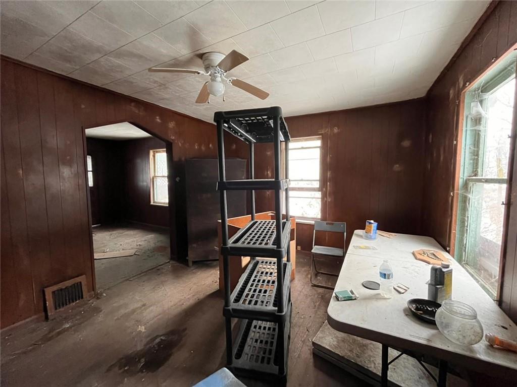 832 Oak Avenue Rochester, PA 15074 - Photo 38 of 50 a view of a dining room with furniture window and wooden floor