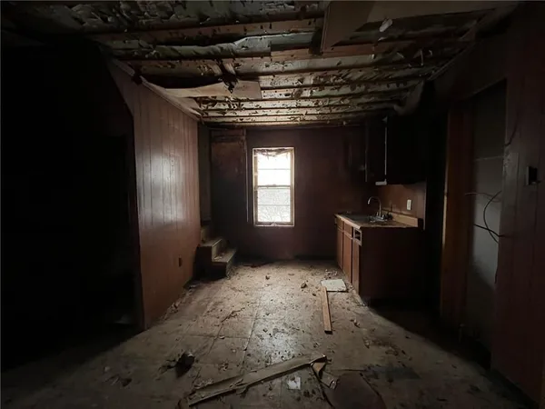 a bathroom with a sink and a shower