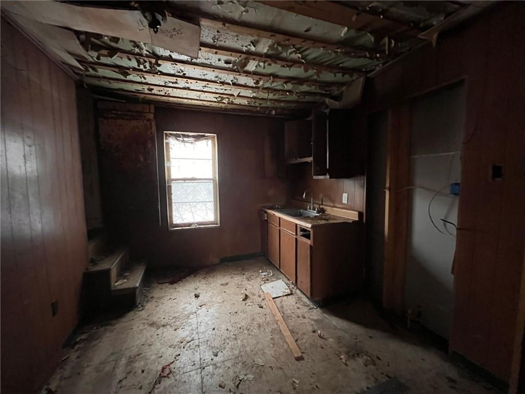 832 Oak Avenue Rochester, PA 15074 - Photo 45 of 50 a kitchen with a refrigerator and a stove