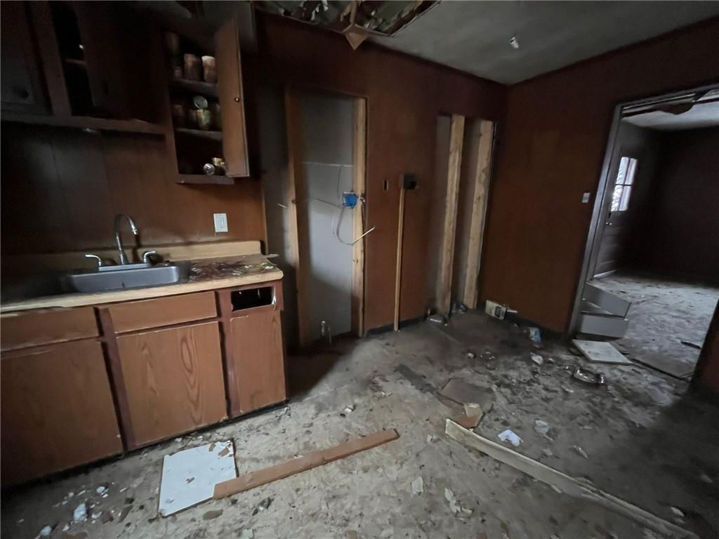 832 Oak Avenue Rochester, PA 15074 - Photo 46 of 50 a kitchen with a sink and cabinets