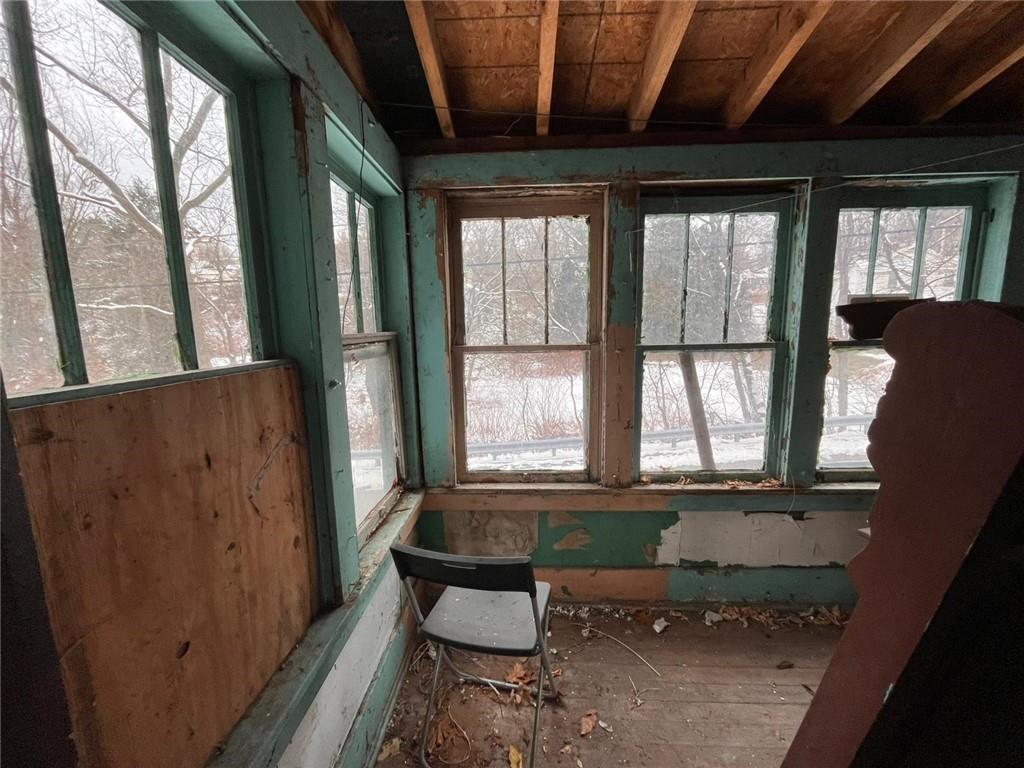 832 Oak Avenue Rochester, PA 15074 - Photo 9 of 50 a bath room with a chair and a window