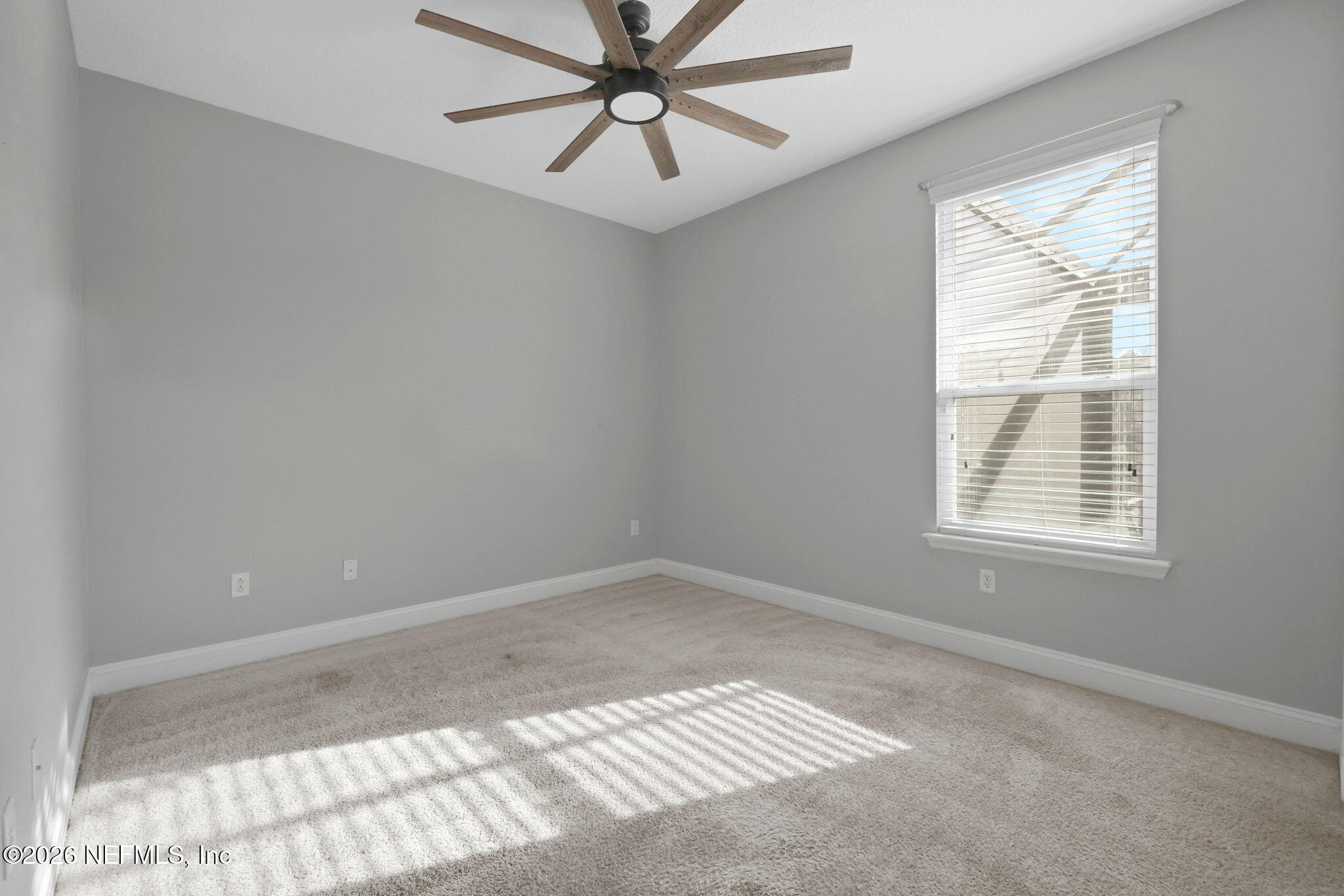 182 St Kitts Loop St. Augustine, FL 32092 - Photo 28 of 71 a view of an empty room with a window