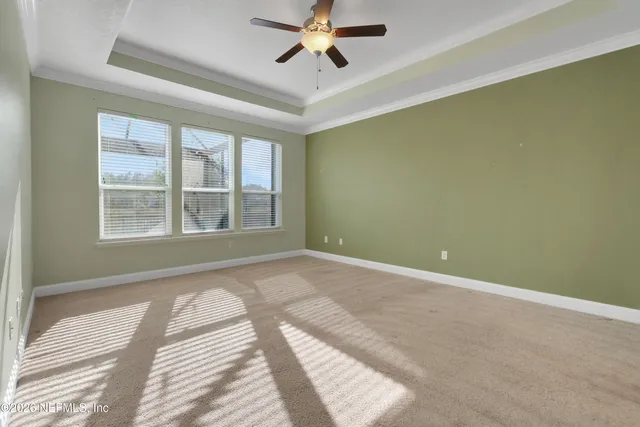 a bathroom with a shower and a sink