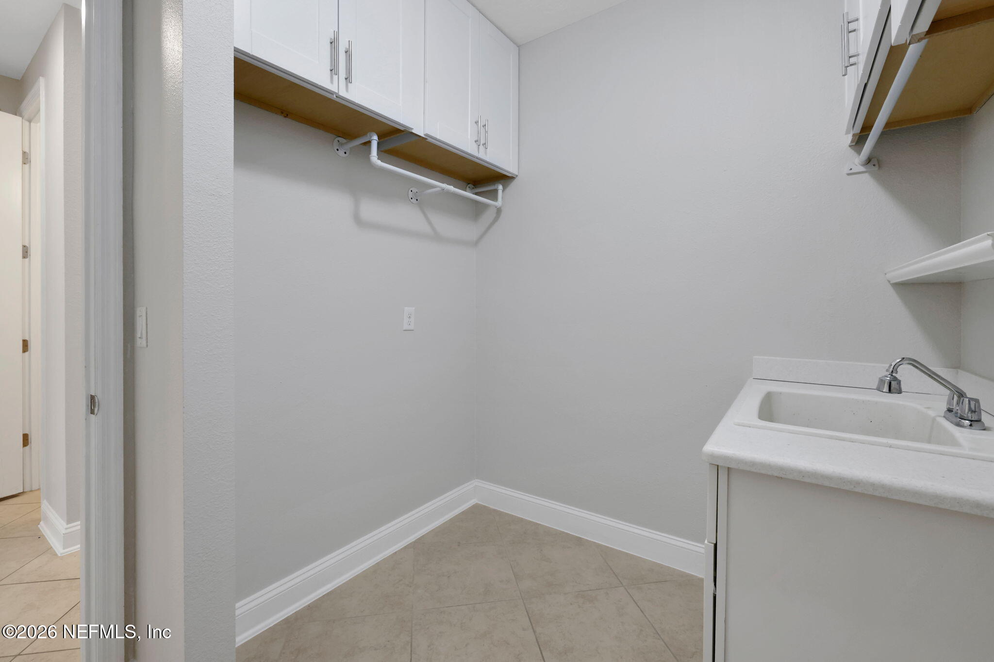 182 St Kitts Loop St. Augustine, FL 32092 - Photo 43 of 71 a bathroom with a sink and toilet