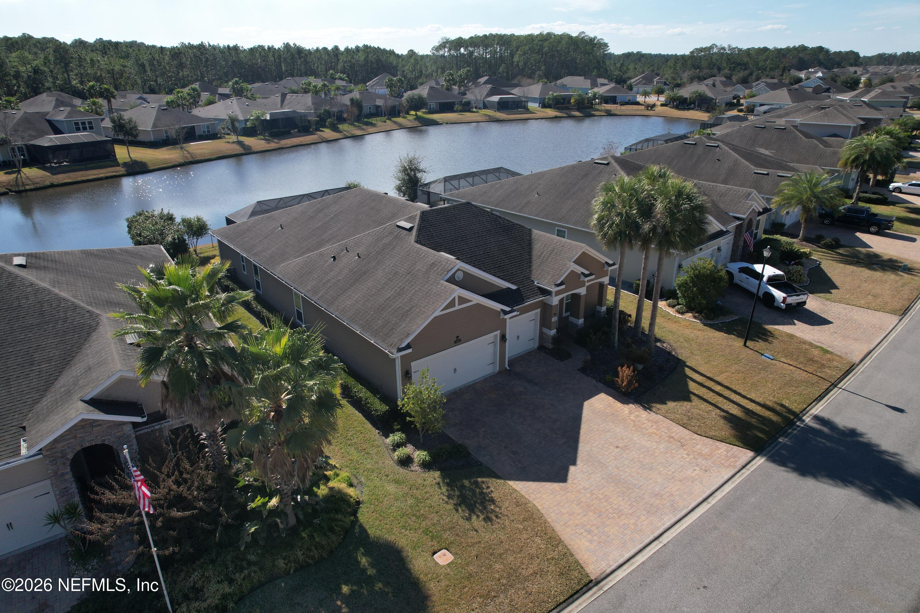 182 St Kitts Loop St. Augustine, FL 32092 - Photo 53 of 71 a view of a lake with sitting space