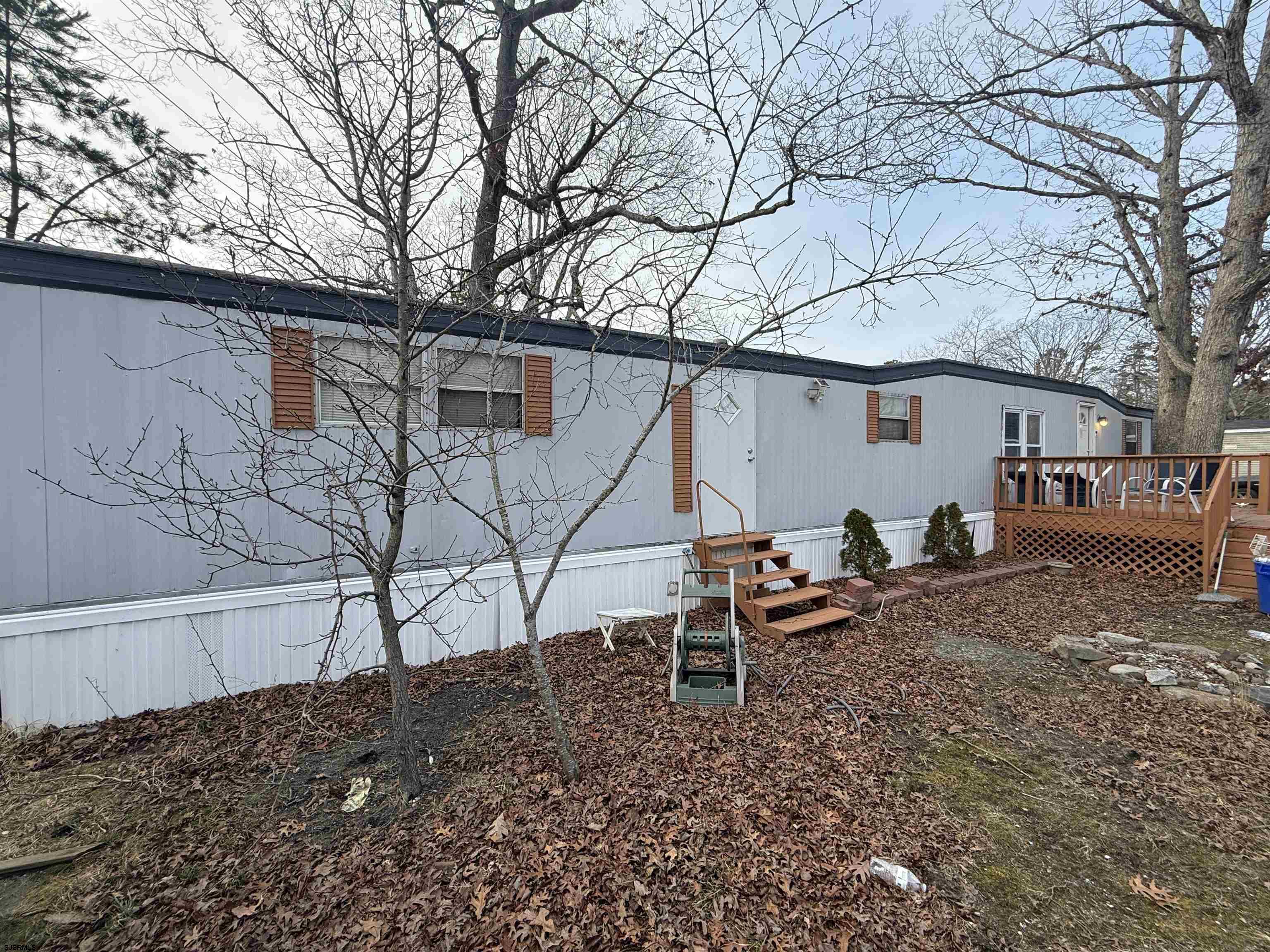2501 Tilton Road Egg Harbor Township, NJ 08234 - Photo 18 of 20 a backyard of a house with table and chairs