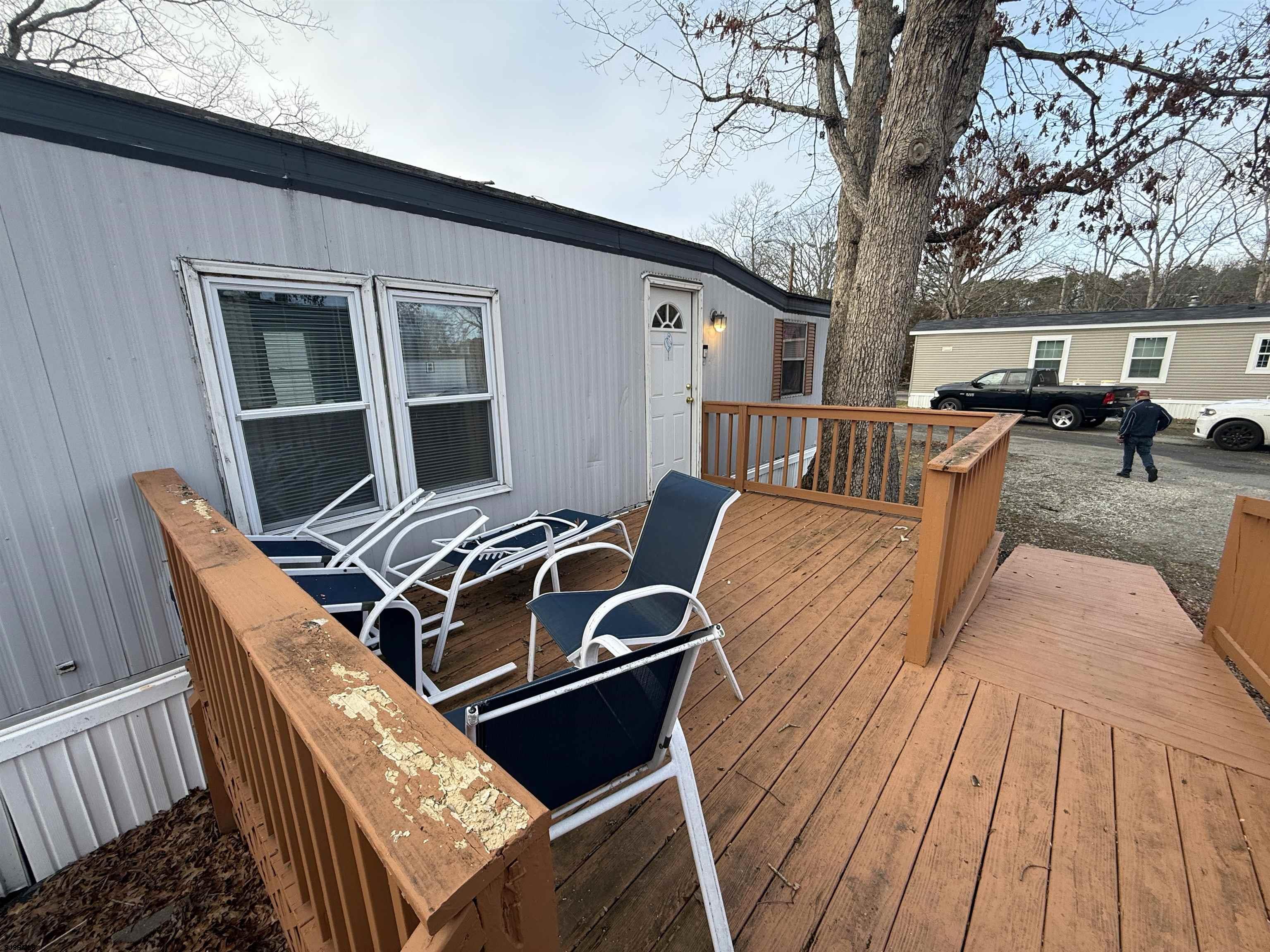 2501 Tilton Road Egg Harbor Township, NJ 08234 - Photo 20 of 20 a backyard of a house with table and chairs