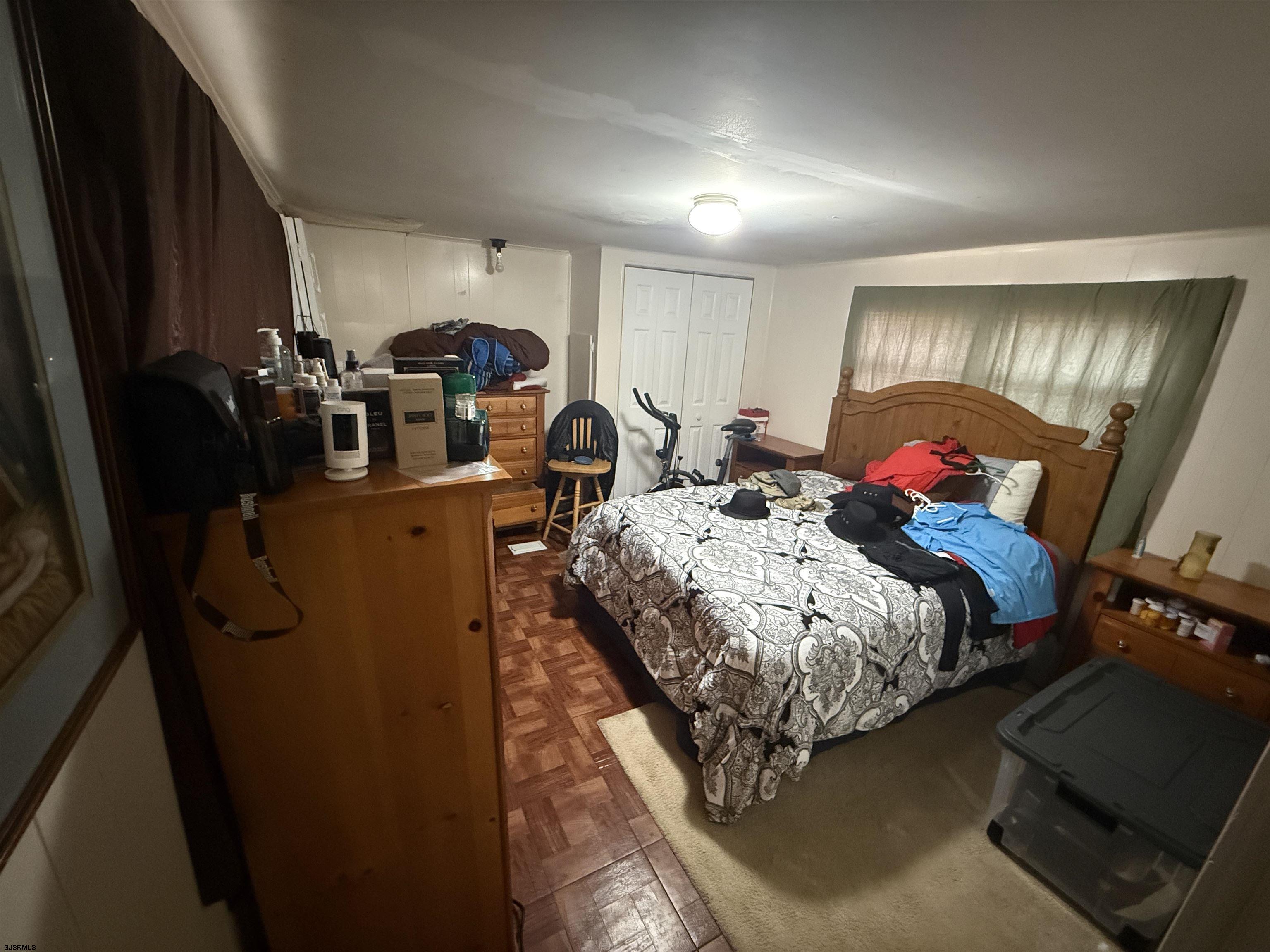 2501 Tilton Road Egg Harbor Township, NJ 08234 - Photo 8 of 20 a bed sitting in a room next to a window