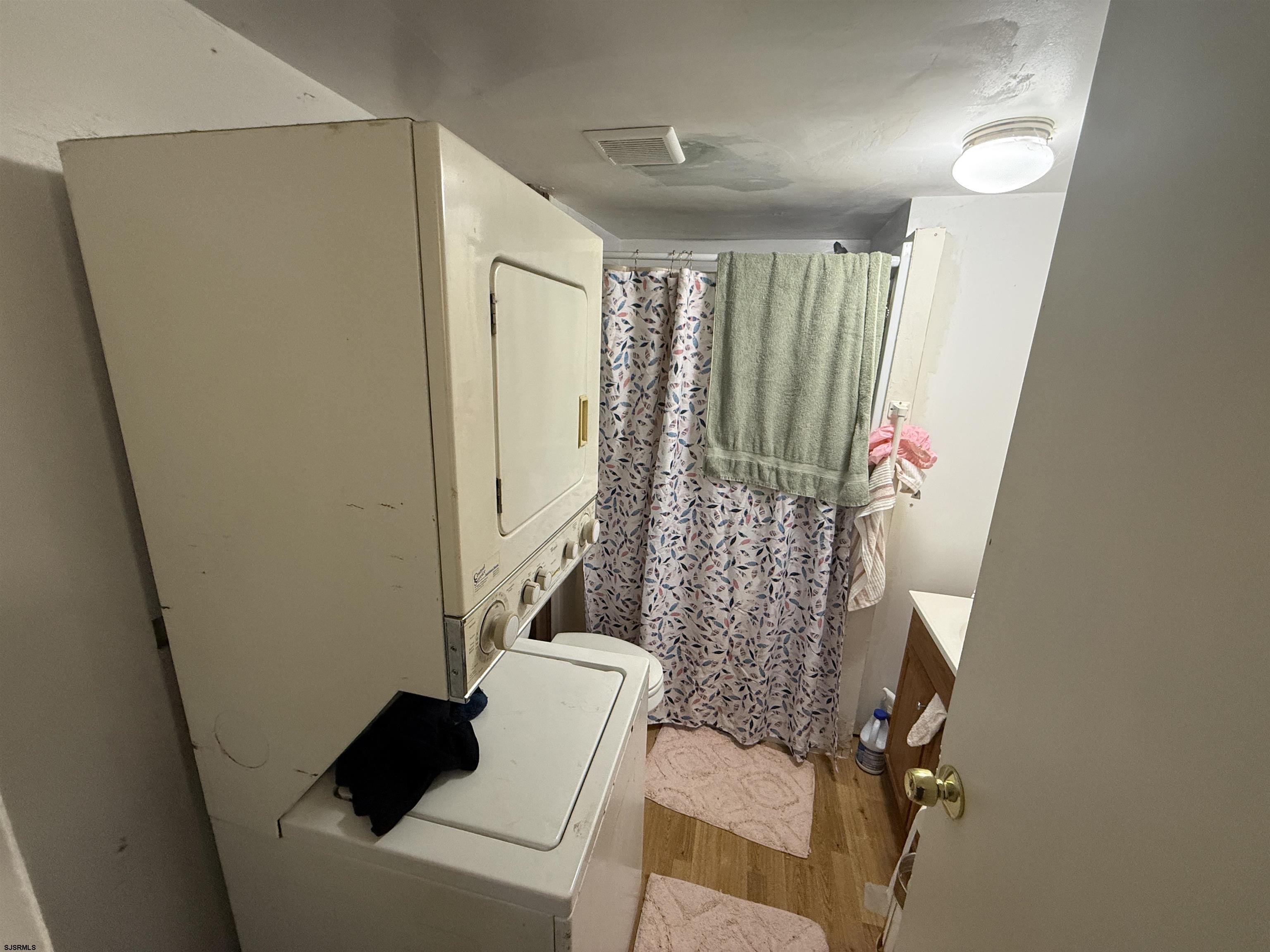 2501 Tilton Road Egg Harbor Township, NJ 08234 - Photo 10 of 20 a bathroom with a sink toilet and shower