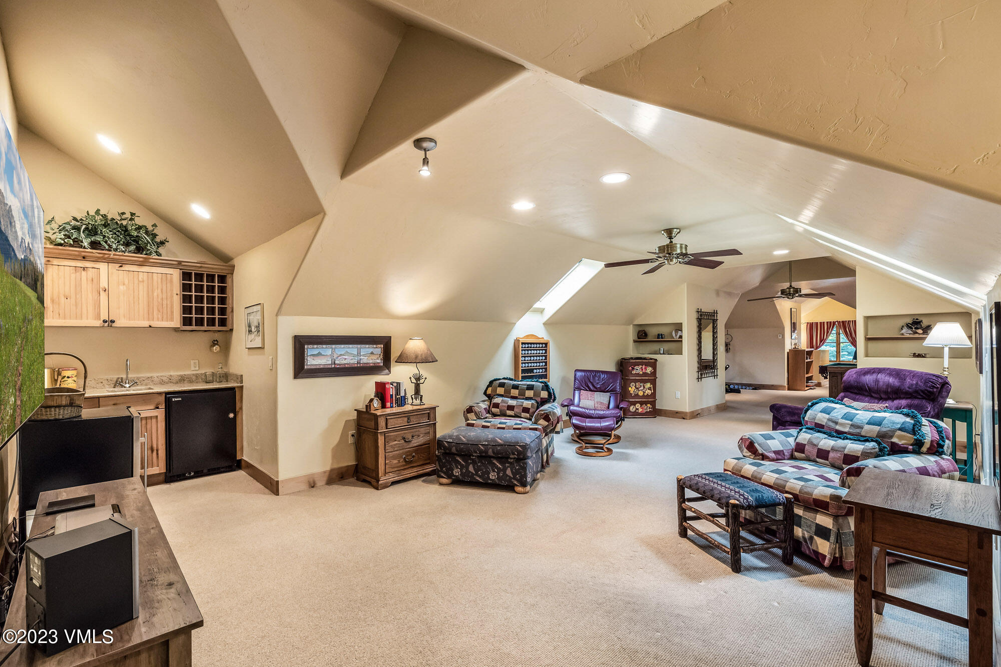 119 Sawmill Circle Eagle, CO 81631 - Photo 18 of 45 a living room with furniture and a flat screen tv