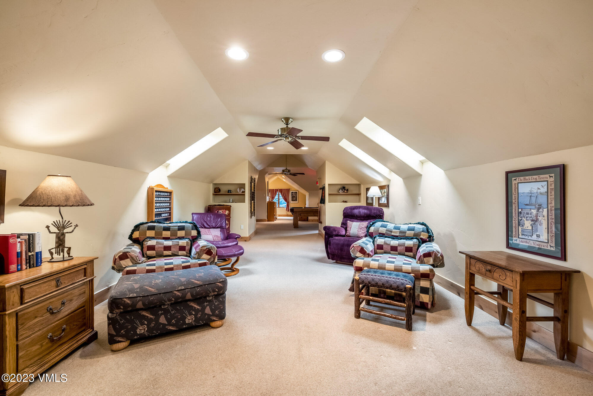119 Sawmill Circle Eagle, CO 81631 - Photo 19 of 45 a living room with furniture and a chandelier
