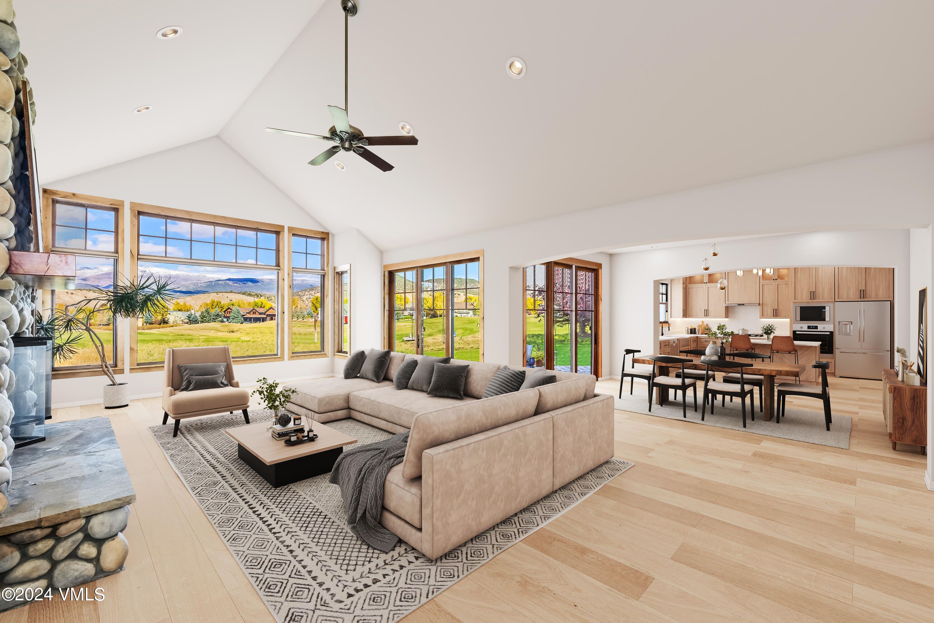 119 Sawmill Circle Eagle, CO 81631 - Photo 3 of 45 a living room with furniture kitchen view and a large window