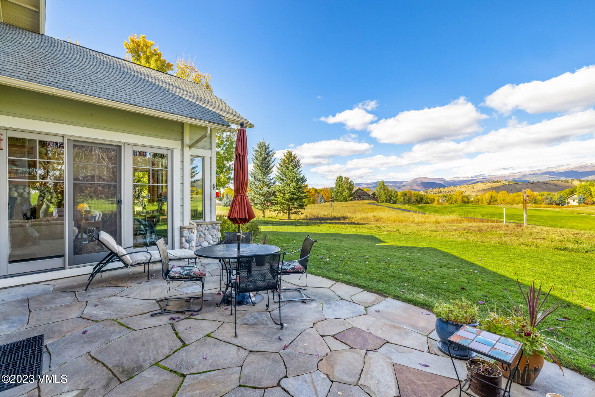 119 Sawmill Circle Eagle, CO 81631 - Photo 34 of 45 a view of a chairs and table in patio with a yard