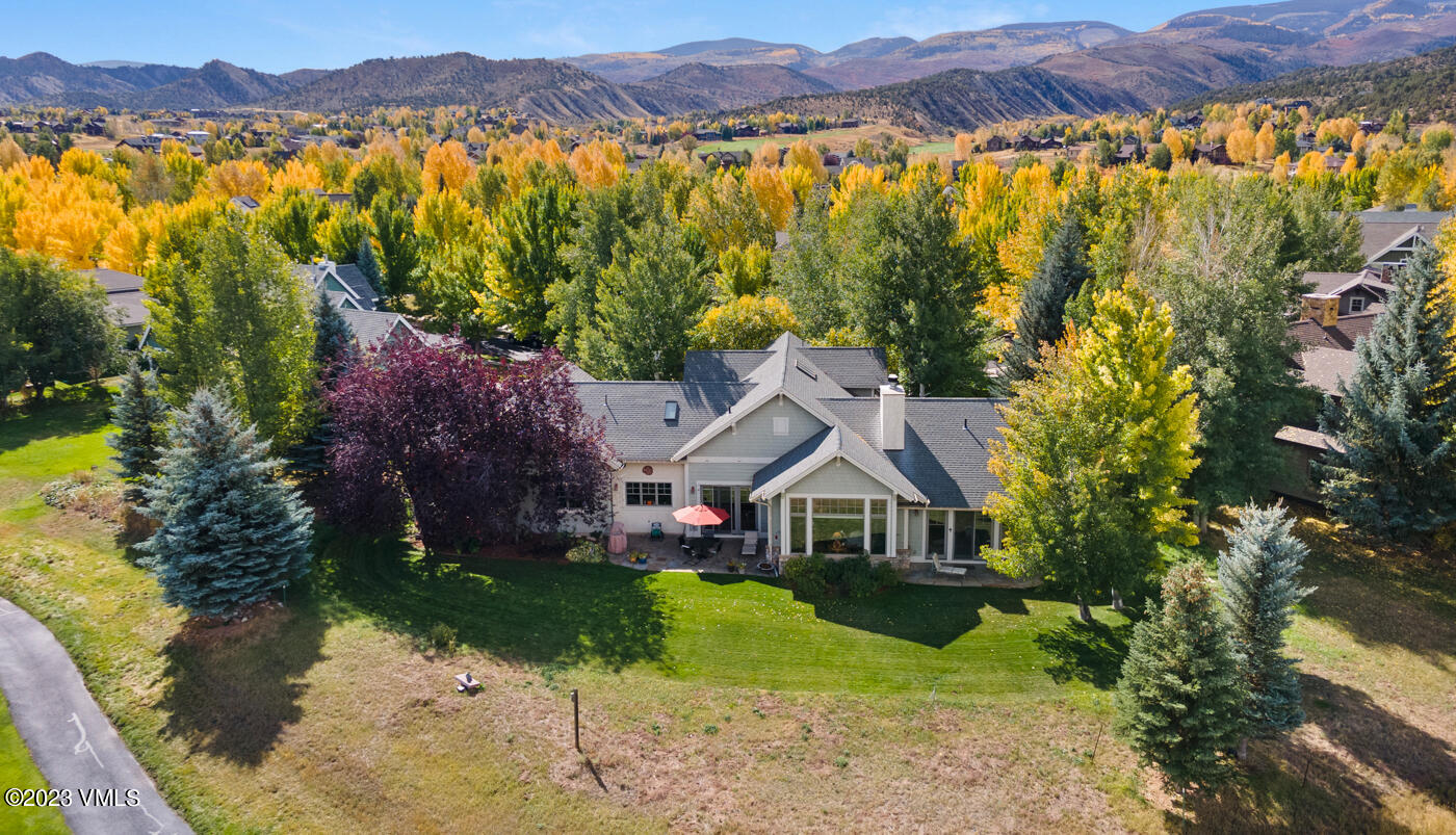 119 Sawmill Circle Eagle, CO 81631 - Photo 36 of 45 a front view of a house with a yard and lake view