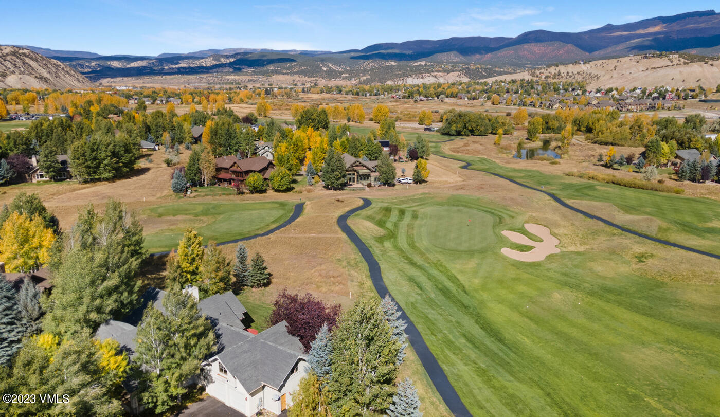 119 Sawmill Circle Eagle, CO 81631 - Photo 42 of 45 a view of a swimming pool with a table and chairs