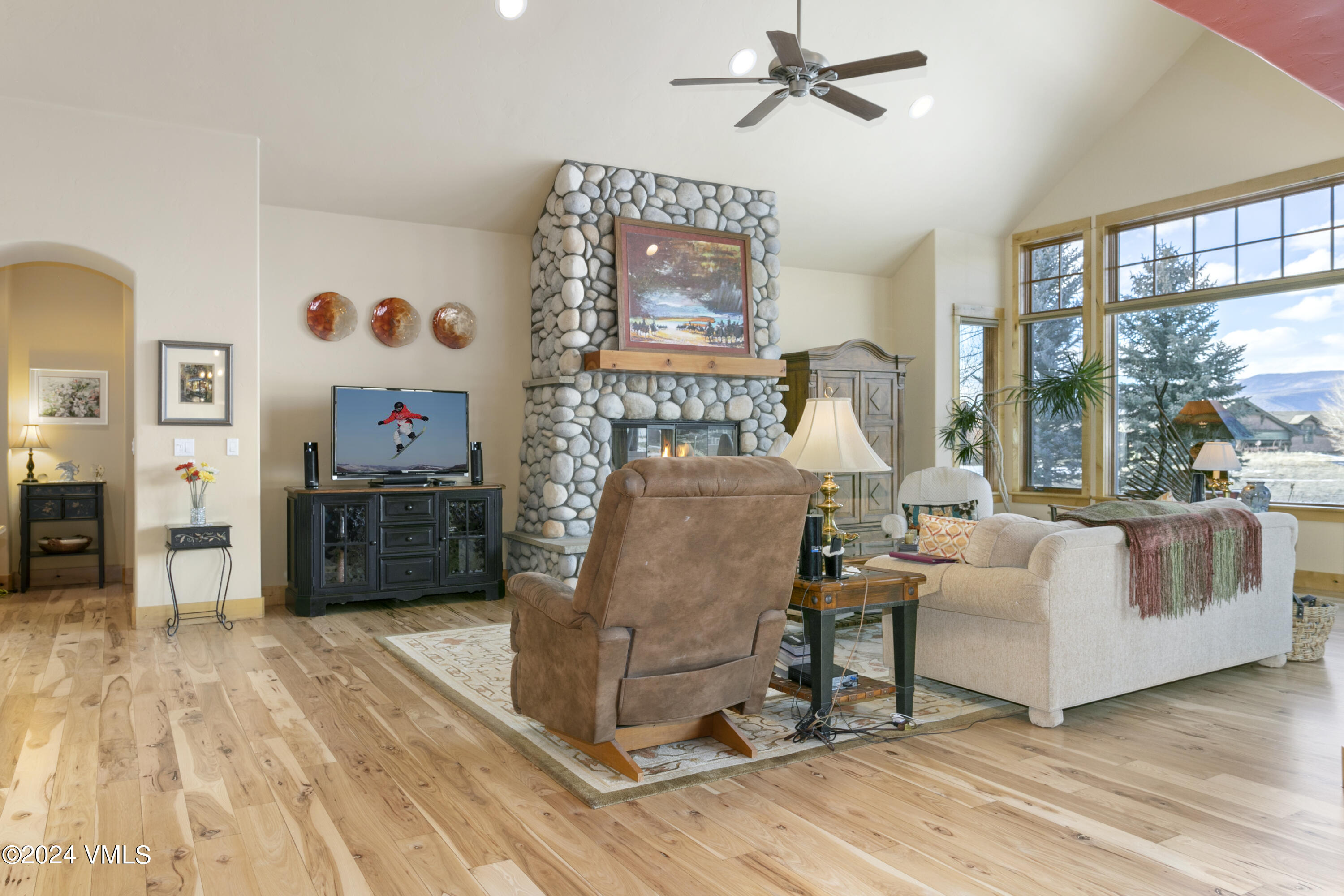 119 Sawmill Circle Eagle, CO 81631 - Photo 10 of 45 a living room with furniture and a large window