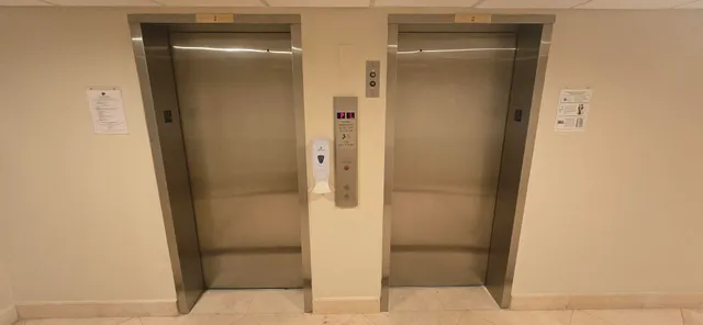 a view of a living room and dining room