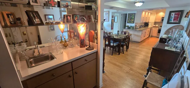 a living room with furniture a fireplace and a table