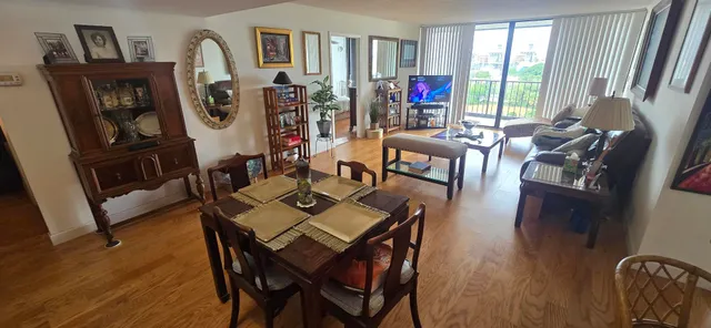 a kitchen with sink refrigerator and microwave