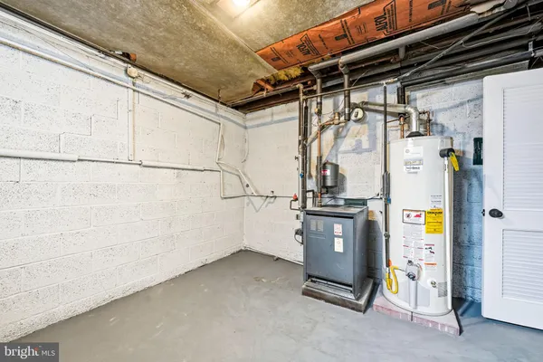 a view of a storage & utility room with washer and dryer