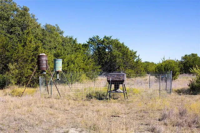 a view of a yard with a slide