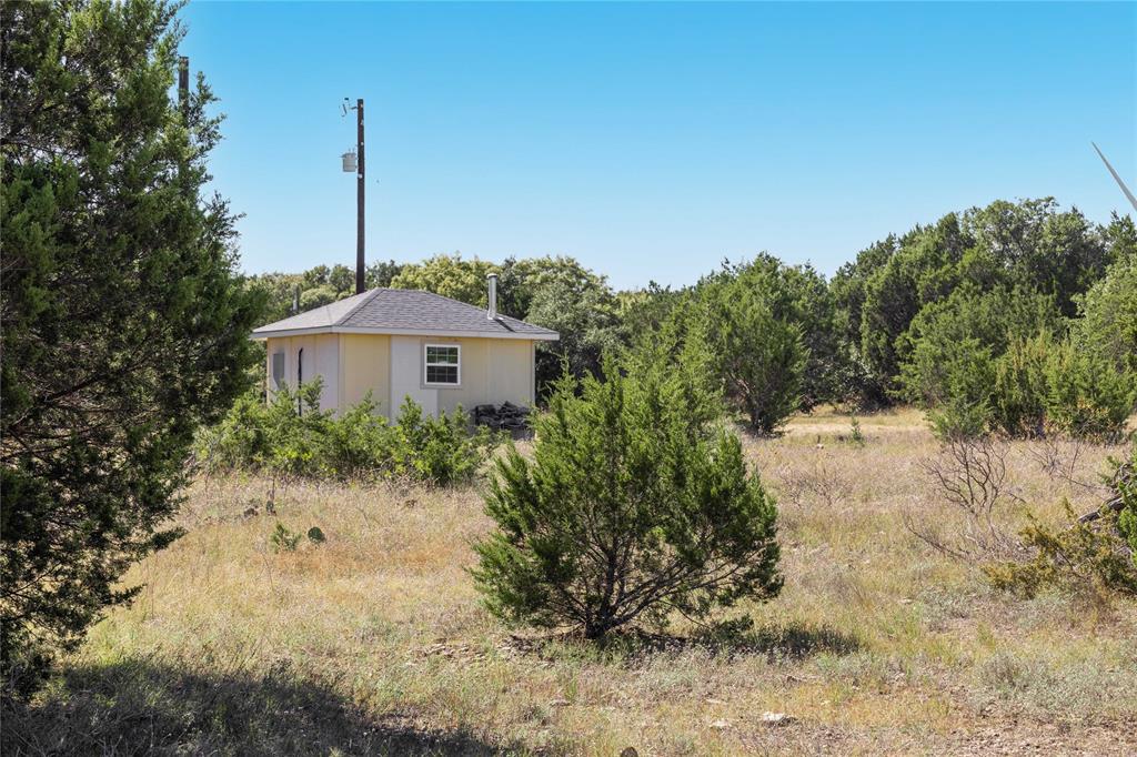 52-acres 52-acres Cr-407 Road Baird, TX 79504 - Photo 13 of 39 a front view of a house with a yard