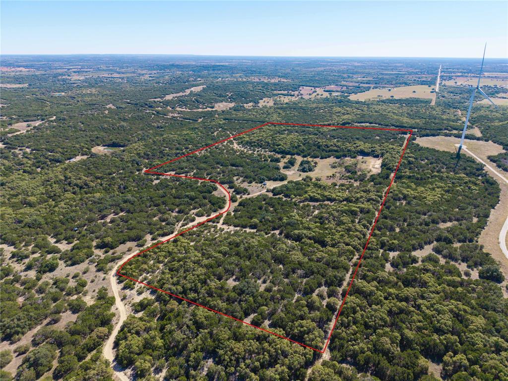 52-acres 52-acres Cr-407 Road Baird, TX 79504 - Photo 27 of 39 an aerial view of residential houses with outdoor space and trees