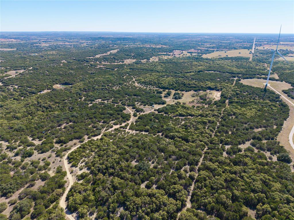 52-acres 52-acres Cr-407 Road Baird, TX 79504 - Photo 34 of 39 an aerial view of residential houses with outdoor space and trees