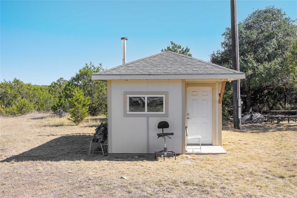52-acres 52-acres Cr-407 Road Baird, TX 79504 - Photo 7 of 39 a front view of a house with a yard