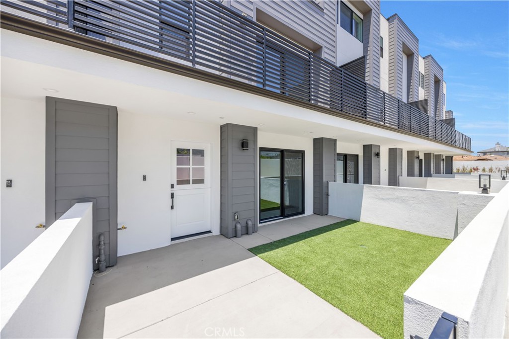 a view of house with yard